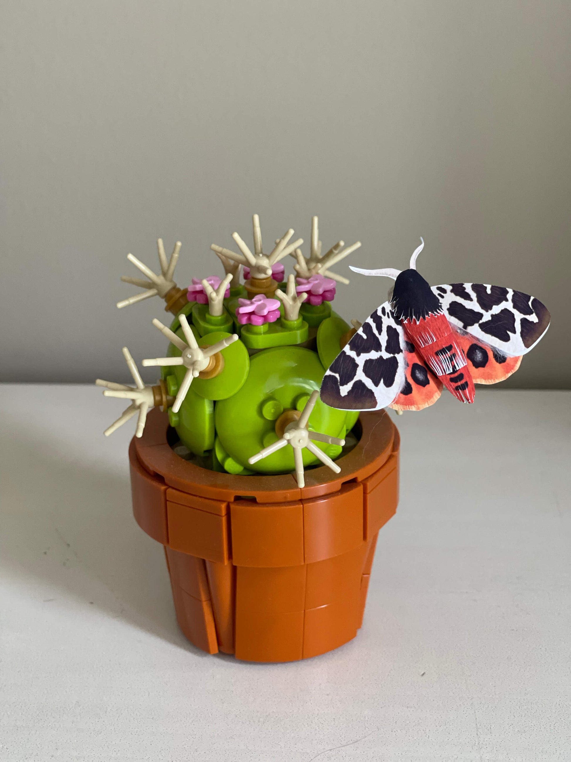 DIY Paper Garden Tiger Moth on a Lego Cactus