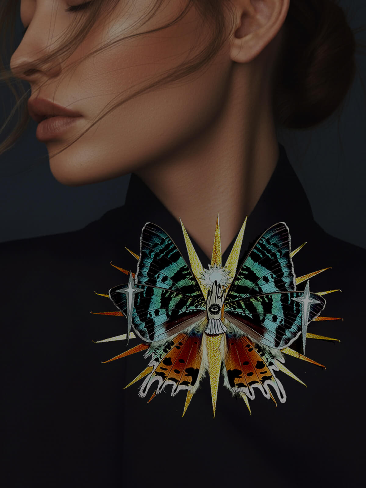 Madagascar Ray, Fantasy Paper Moth ased on Madagascan Sunset Moth, a woman wearing a butterfly-shaped brooch with a dark background