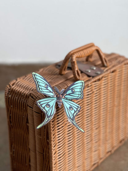 Paper Moth, Paper Spanish Moon Moth, Spanish Luna Moth staying on a Picnic Basket