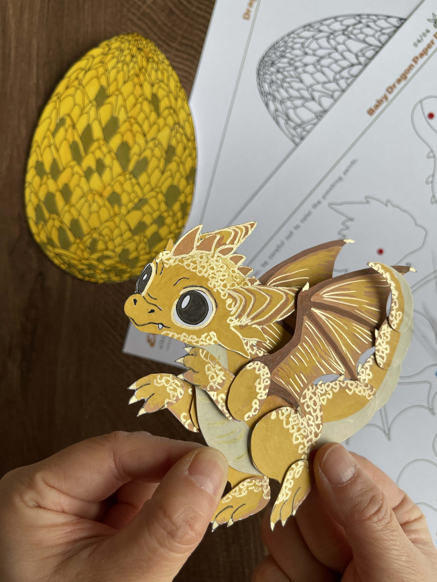 golden baby dragon paper doll and dragon egg