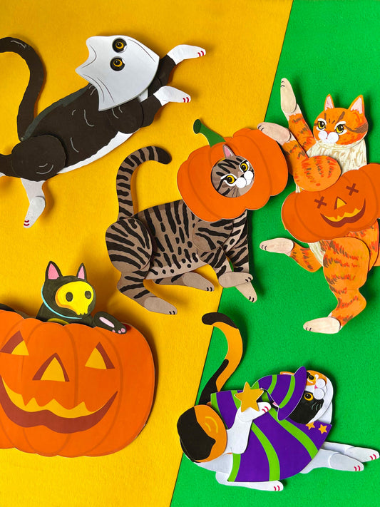 Halloween cat paper dolls, made from a digital template. It can be a decorative piece, a charming Christmas ornament, Halloween ornament, gift tag, or delightful fridge art.