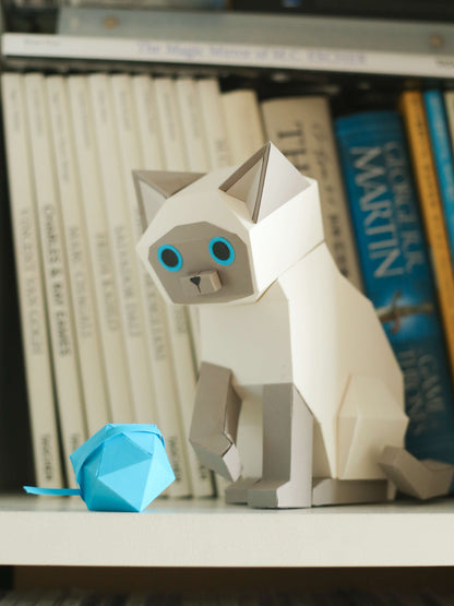 papercraft siamese cat playing with a blue yarn ball, an adorable DIY gift or for home decor, made from Digital Template